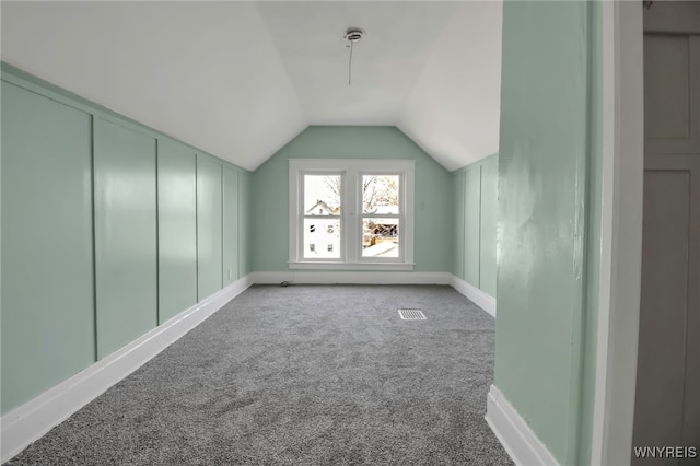 2254 Grand Ave, Niagara Falls, NY 14301 - additional living space with lofted ceiling, carpet floors, and baseboards