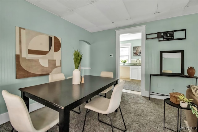 2254 Grand Ave, Niagara Falls, NY 14301 - dining room featuring carpet floors and baseboards