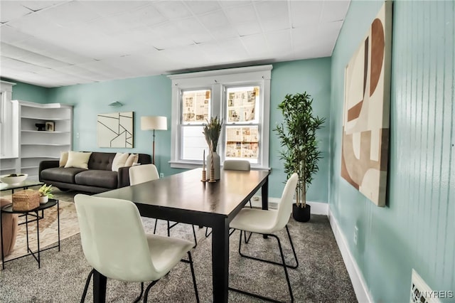 2254 Grand Ave, Niagara Falls, NY 14301 - dining space featuring baseboards and a desk