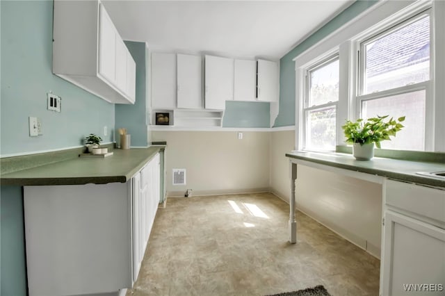 2254 Grand Ave, Niagara Falls, NY 14301 - kitchen with white cabinets and light flooring
