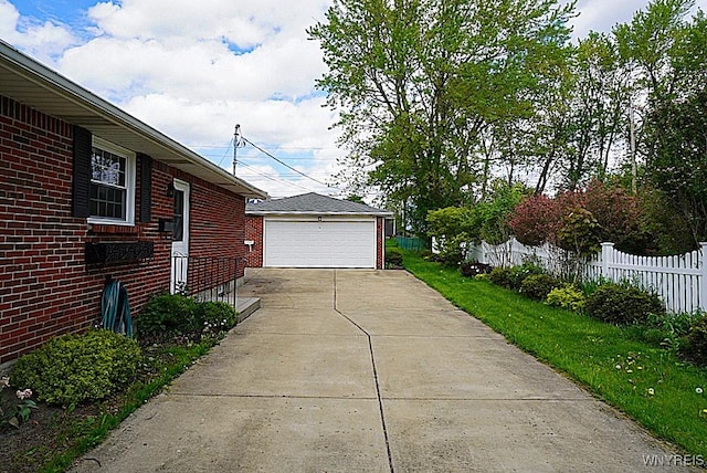 detached garage with fence