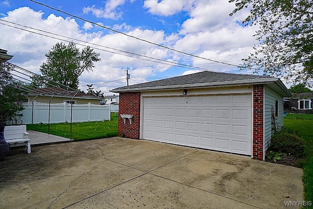 detached garage with fence