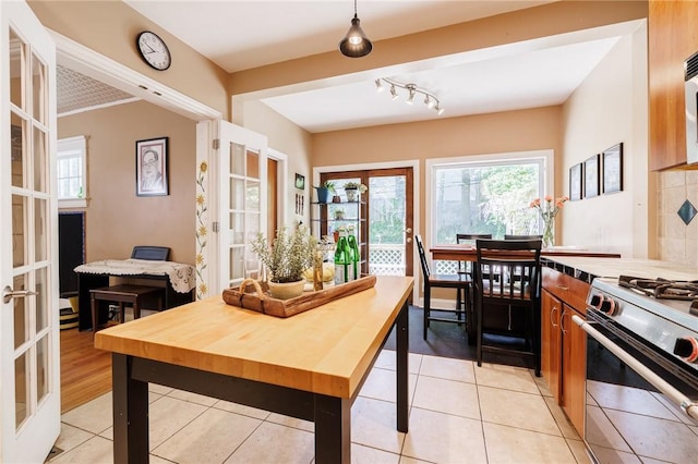 141 Mulberry St, Rochester, NY 14620 - dining room with light tile patterned floors and plenty of natural light
