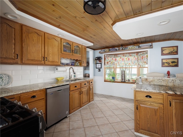 127 W St, Rutland, NY 13612 - kitchen with a sink, wood ceiling, appliances with stainless steel finishes, brown cabinets, and light stone countertops