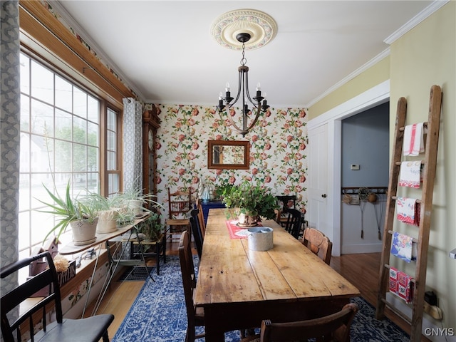 127 W St, Rutland, NY 13612 - dining space featuring a chandelier, light wood-style flooring, wallpapered walls, and ornamental molding