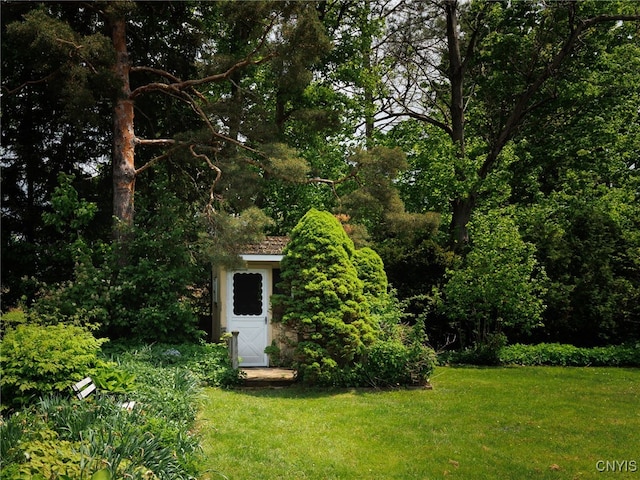 127 W St, Rutland, NY 13612 - view of grassy yard with an outdoor structure