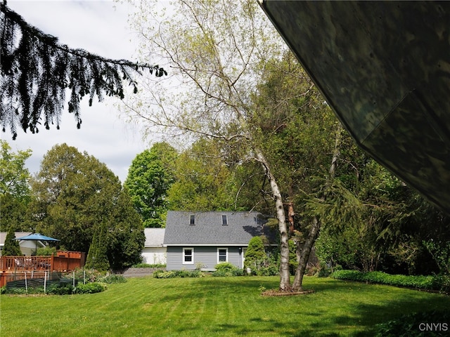 127 W St, Rutland, NY 13612 - view of grassy yard with a deck