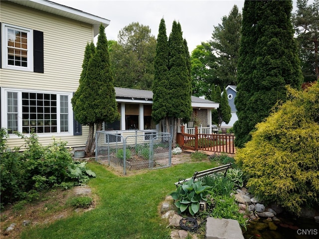 127 W St, Rutland, NY 13612 - back of property with a yard and a garden