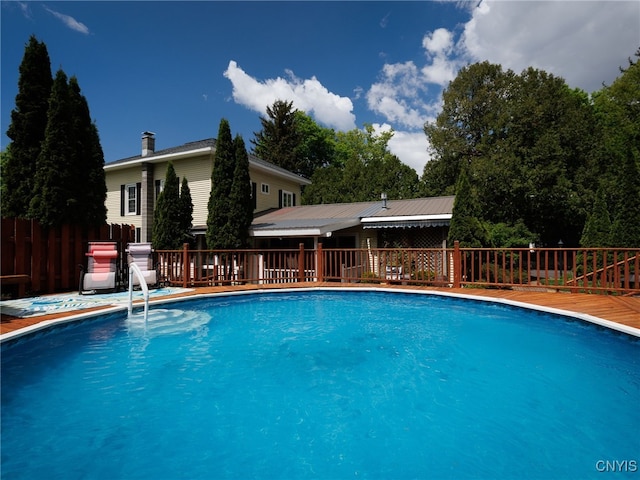 127 W St, Rutland, NY 13612 - view of pool featuring a wooden deck and fence
