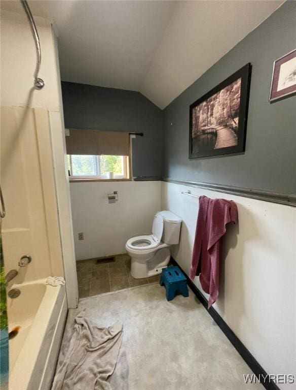 13209 Miller Ave, Sardinia, NY 14030 - full bathroom featuring toilet, lofted ceiling, and shower / washtub combination