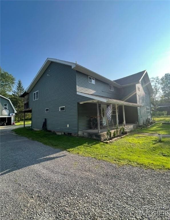 13209 Miller Ave, Sardinia, NY 14030 - view of property exterior featuring a porch