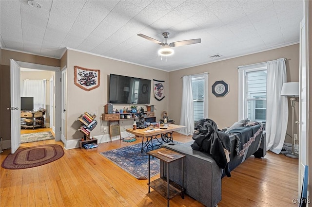119 Charles Ave, Geddes, NY 13209 - living area featuring hardwood / wood-style flooring, a desk, ceiling fan, ornamental molding, and baseboards