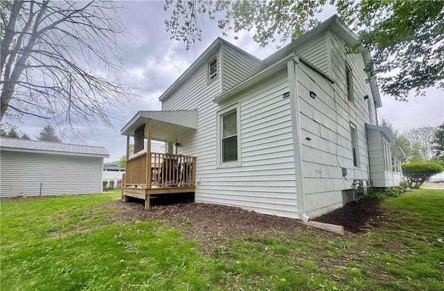 11 Gilbert St, Oneonta-City, NY 13820 - back of house with a deck and a yard