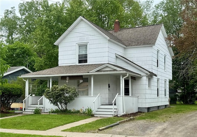 11 Gilbert St, Oneonta-City, NY 13820 - view of front of home with roof with shingles, covered porch, a chimney, and a front yard