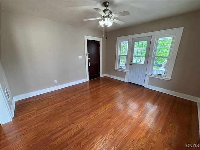 236 N Midler Ave, Syracuse, NY 13206 - foyer with wood finished floors, baseboards, and a ceiling fan