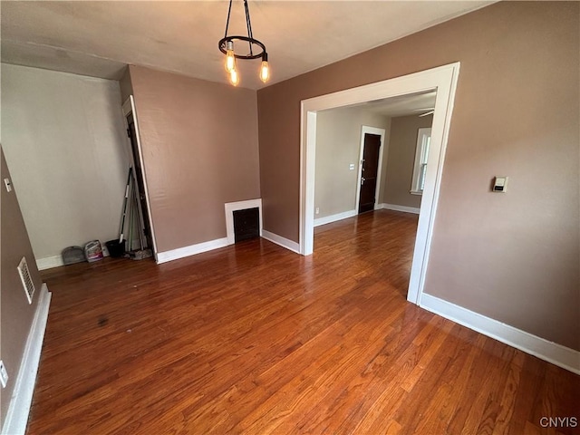236 N Midler Ave, Syracuse, NY 13206 - spare room with wood finished floors and baseboards
