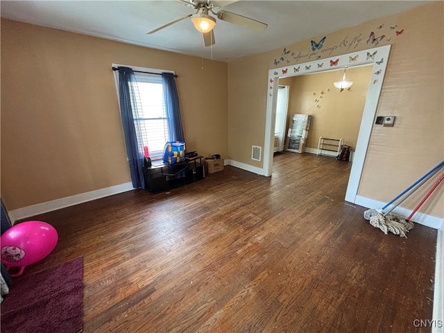 236 N Midler Ave, Syracuse, NY 13206 - spare room featuring wood finished floors, a ceiling fan, and baseboards