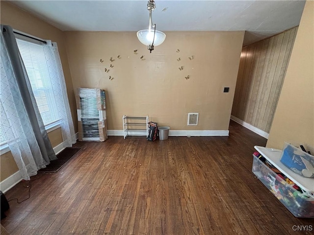 236 N Midler Ave, Syracuse, NY 13206 - unfurnished dining area featuring wood finished floors and baseboards