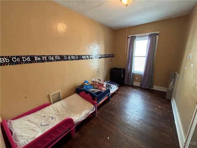 236 N Midler Ave, Syracuse, NY 13206 - bedroom with wood finished floors and baseboards