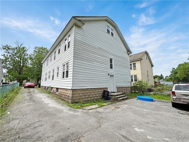 236 N Midler Ave, Syracuse, NY 13206 - view of side of home featuring fence