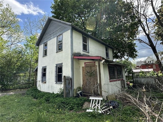 313 W 4th St, Elmira-City, NY 14901 - view of front of home with fence