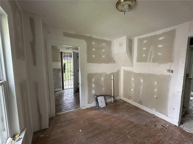 313 W 4th St, Elmira-City, NY 14901 - unfurnished living room featuring wood finished floors