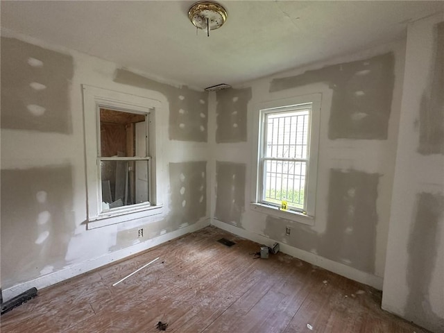 313 W 4th St, Elmira-City, NY 14901 - spare room featuring hardwood / wood-style floors and baseboards