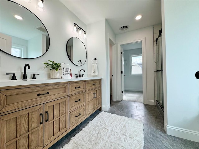 4 Brookwood Hills Dr, Big Flats, NY 14845 - bathroom with baseboards, double vanity, an enclosed shower, and recessed lighting