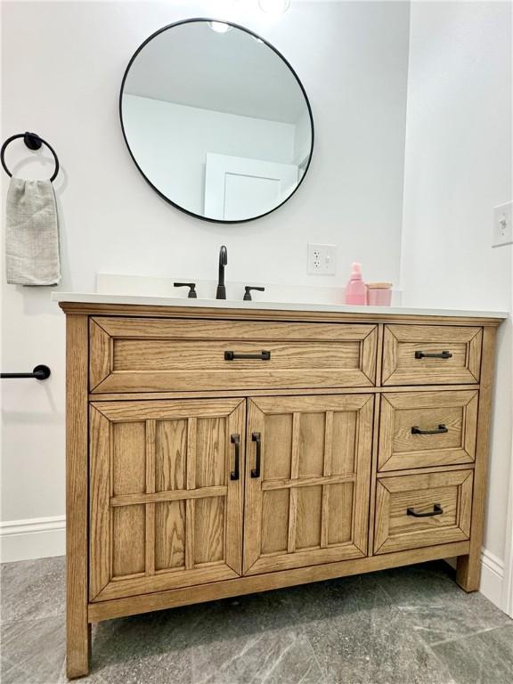 4 Brookwood Hills Dr, Big Flats, NY 14845 - bathroom featuring vanity and baseboards