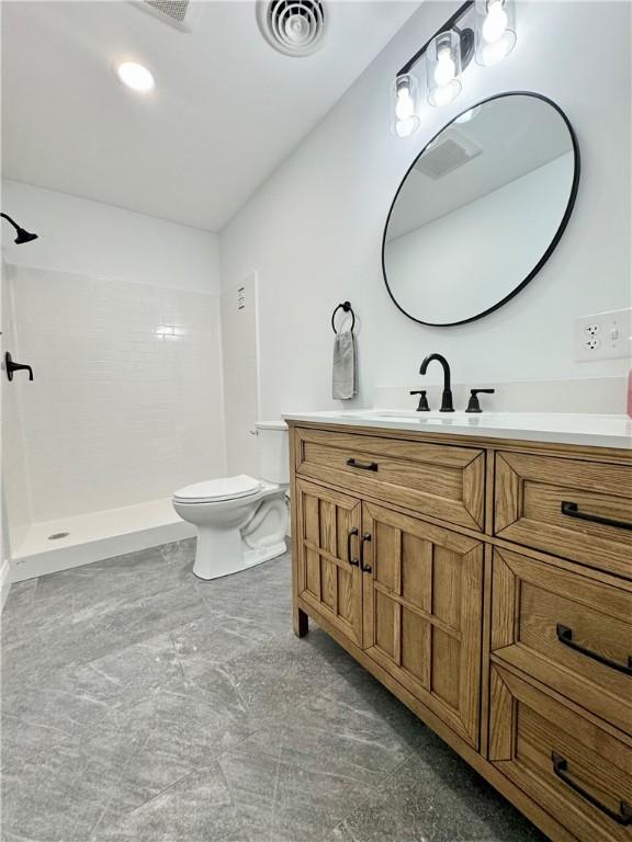 4 Brookwood Hills Dr, Big Flats, NY 14845 - full bathroom featuring vanity, walk in shower, and toilet