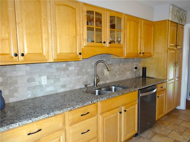 129 Daffodil Dr, Horseheads, NY 14845 - kitchen with stainless steel dishwasher, a sink, light stone countertops, and glass insert cabinets