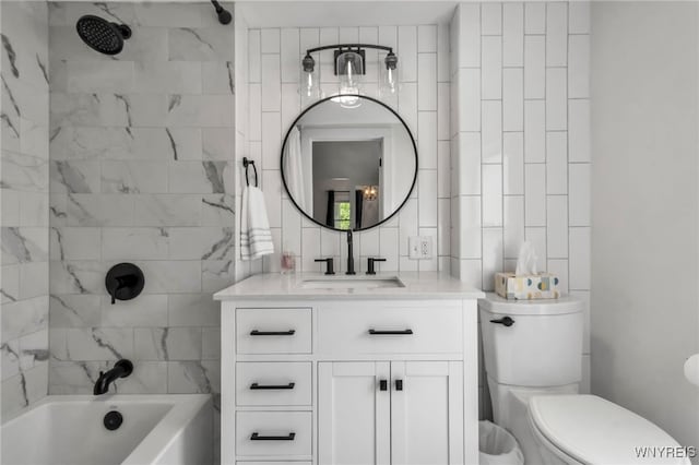 bathroom with vanity, toilet, and shower / bathtub combination