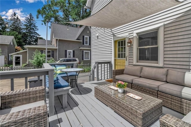 wooden deck featuring an outdoor living space