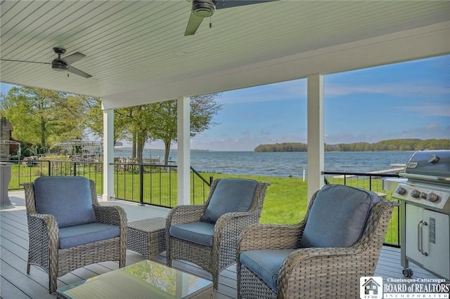 5518 Wells Bay Lakefront, North Harmony, NY 14710 - wooden deck featuring a water view, ceiling fan, a lawn, and area for grilling