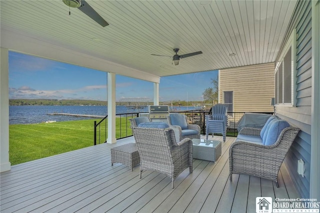 5518 Wells Bay Lakefront, North Harmony, NY 14710 - wooden terrace with a water view, ceiling fan, a yard, and outdoor lounge area