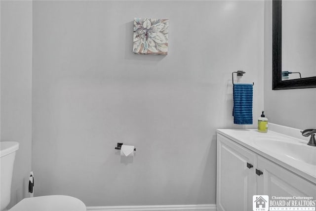 5518 Wells Bay Lakefront, North Harmony, NY 14710 - bathroom with toilet, vanity, and baseboards