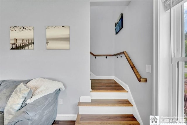 5518 Wells Bay Lakefront, North Harmony, NY 14710 - staircase with baseboards and wood finished floors