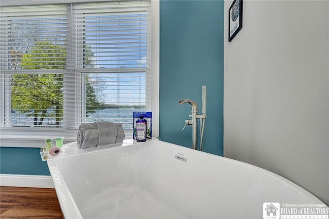 5518 Wells Bay Lakefront, North Harmony, NY 14710 - bathroom view of a soaking tub and wood finished floors