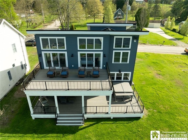 5518 Wells Bay Lakefront, North Harmony, NY 14710 - back of house featuring a lawn, a deck, and outdoor lounge area