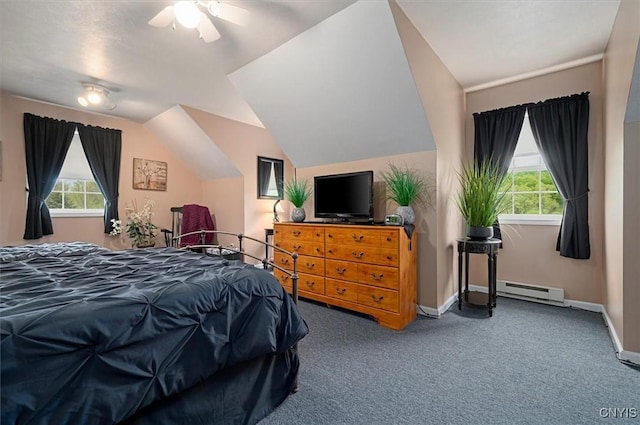 101 Pinehurst Ln, Augusta, NY 13425 - carpeted bedroom featuring a baseboard radiator, multiple windows, vaulted ceiling, and baseboards