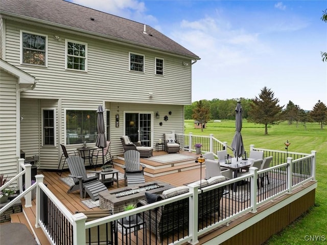 101 Pinehurst Ln, Augusta, NY 13425 - wooden deck with outdoor dining area, a yard, and an outdoor living space with a fire pit