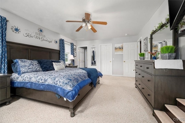 101 Pinehurst Ln, Augusta, NY 13425 - bedroom featuring light carpet, a ceiling fan, and multiple closets