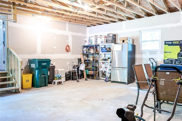 basement with freestanding refrigerator