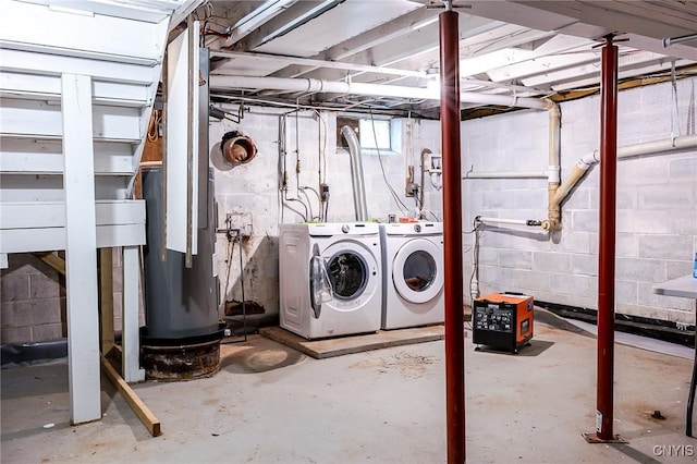 unfinished basement featuring washing machine and dryer