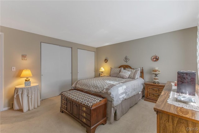 bedroom with light carpet