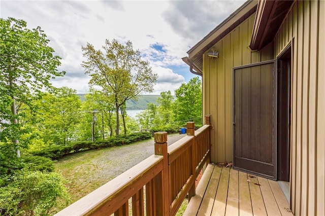 deck featuring a water view