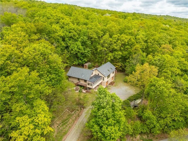 view from above of property with a forest