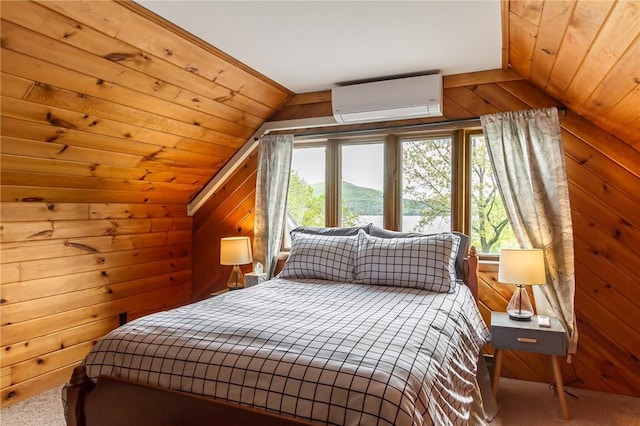 bedroom with a wall mounted air conditioner, vaulted ceiling, multiple windows, carpet, and wood walls