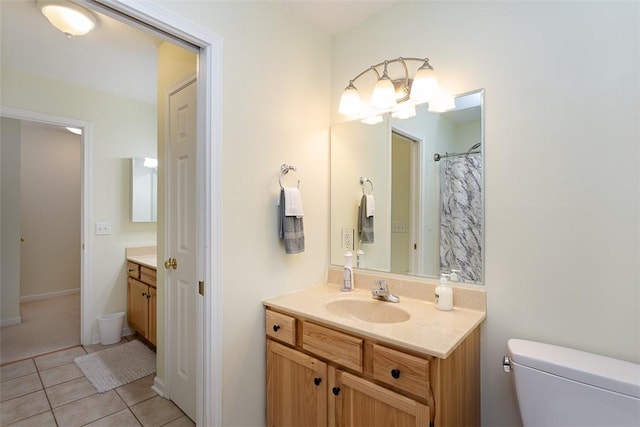 13 Hawthorn Cir, Geneseo, NY 14454 - full bathroom with vanity, toilet, and tile patterned floors
