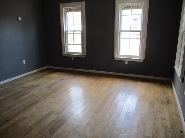 4 Main St, Barton, NY 14859 - empty room featuring wood finished floors and baseboards